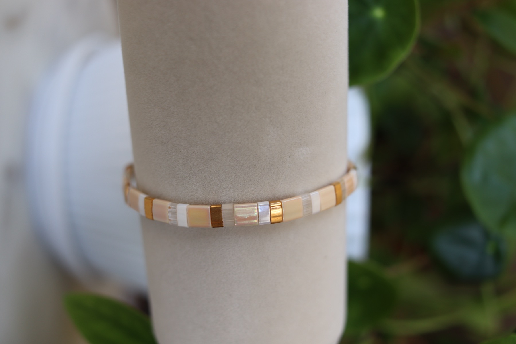 Owner-supplied photograph of a light-toned bracelet on a wrist