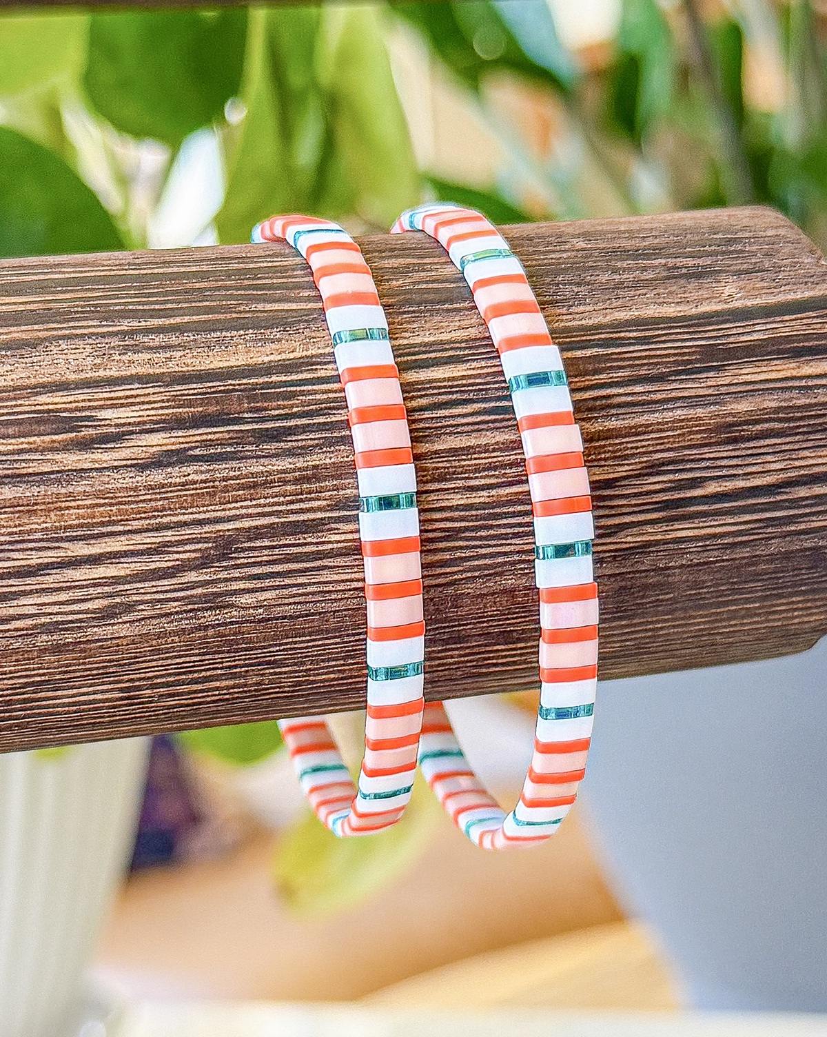 Aruba bracelet close-up photograph in coral, sea-glass aqua, and ivory tones