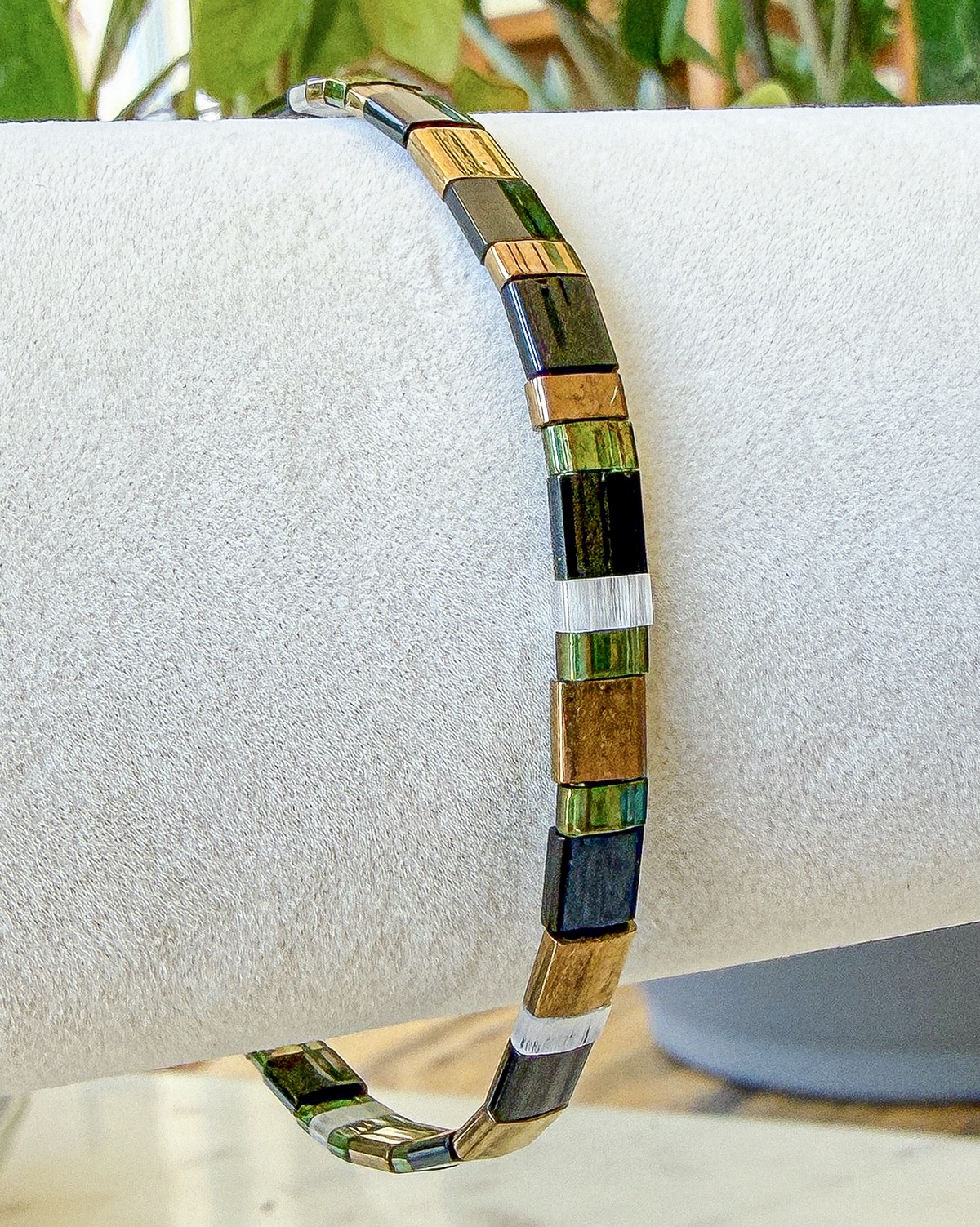 Dublin bracelet close-up photograph in black, ivory, and bronze tones